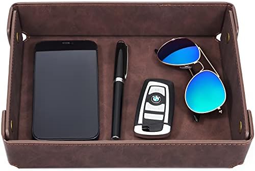 CASIRENA valet tray by the door holding keys and wallet — launch-out kit staging surface for the family entryway reset